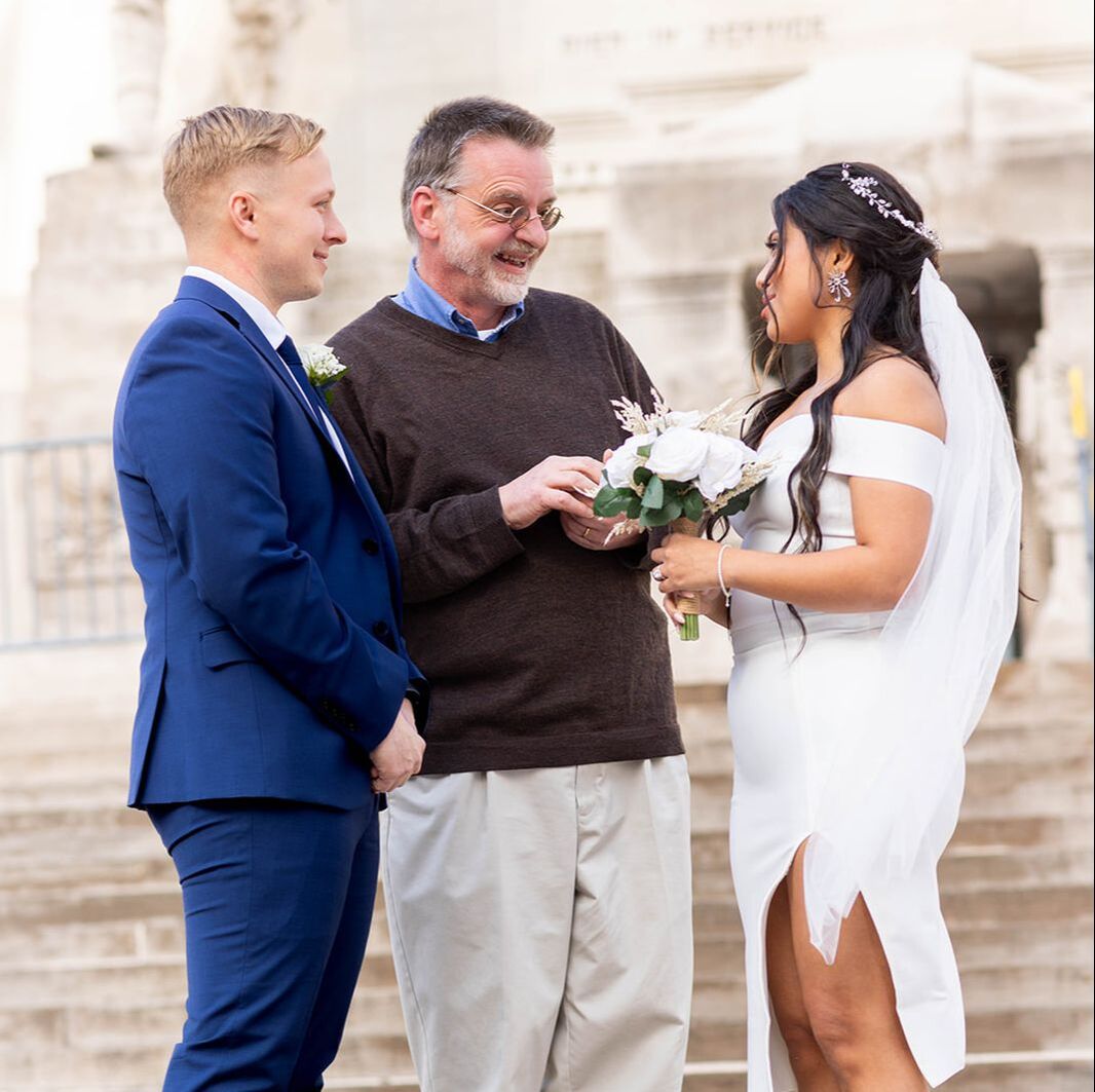 Monument Circle Elopement. Peter Meyer, Indianapolis Wedding Officiant Services. Marry me In Indy LLC